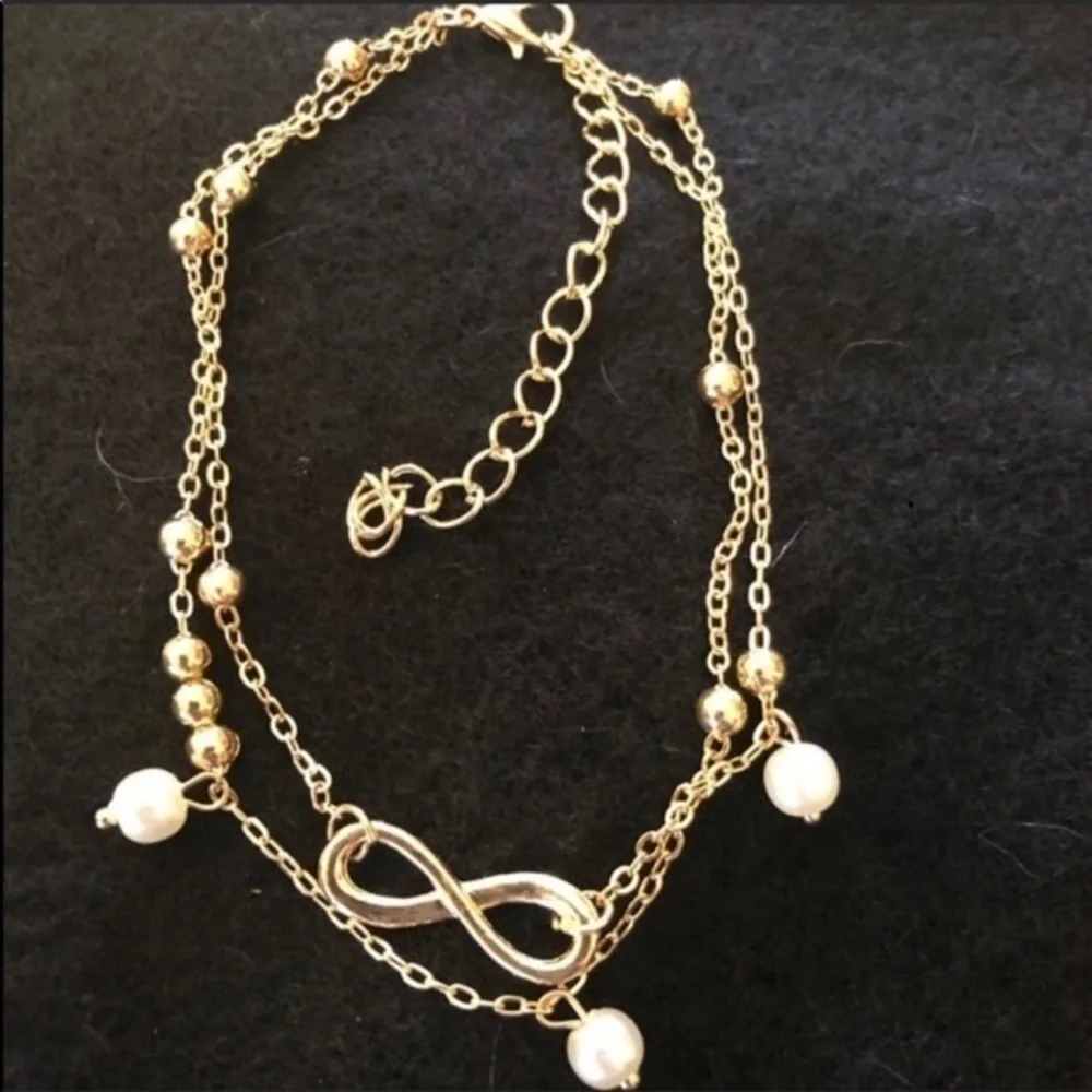 Multilayered ankle bracelet